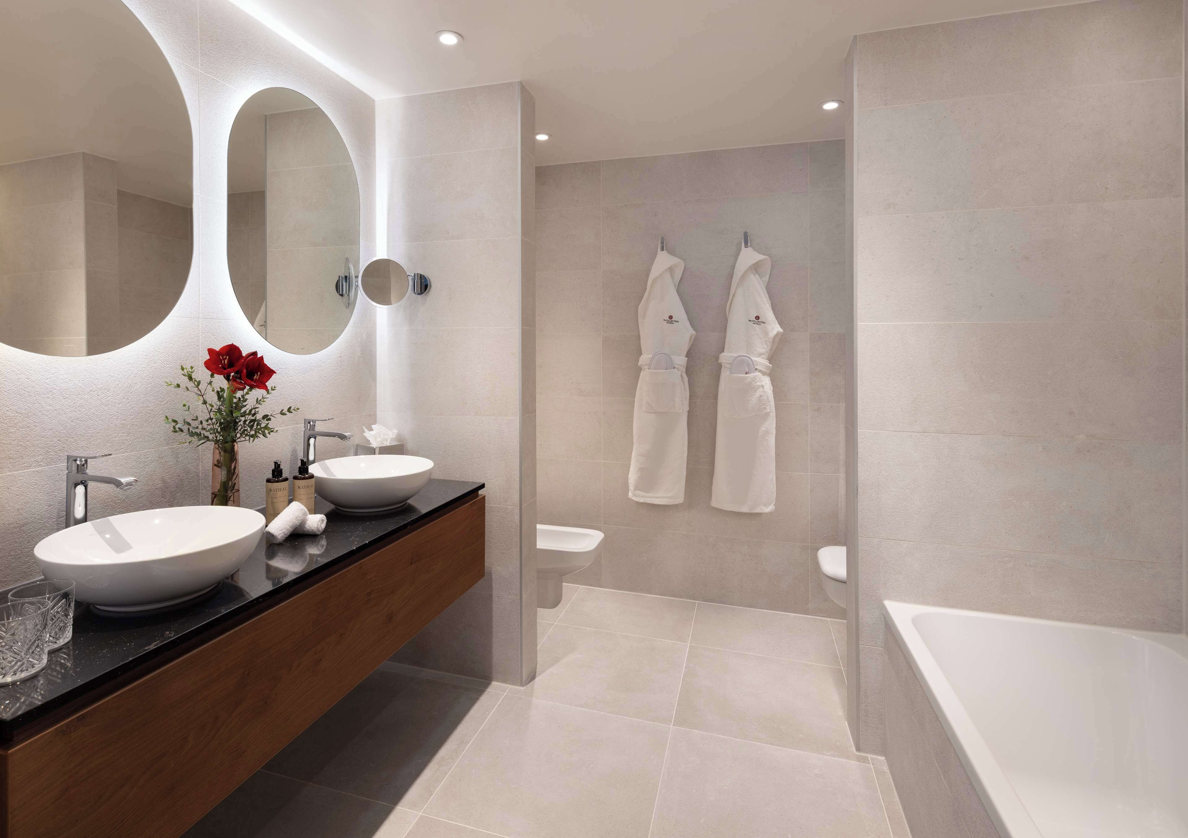 eco-friendly toiletries, hair dryer, slippers, towels