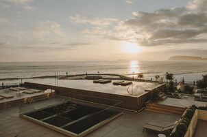 Seasonal outdoor pool, open 11:00 AM to 7:00 PM, sun loungers