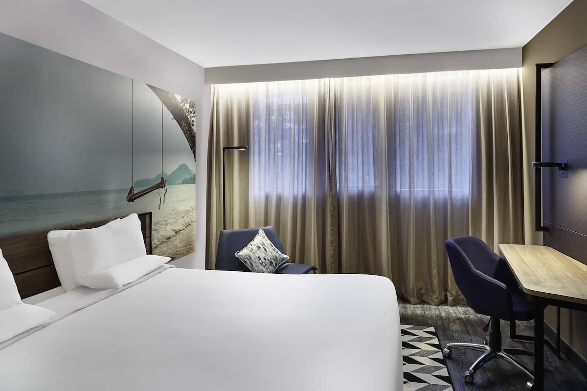 Căn hộ Superior, 1 giường cỡ queen | Bộ đồ giường kháng dị ứng, minibar, két bảo mật tại phòng, bàn