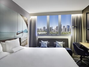 Hypo-allergenic bedding, minibar, in-room safe, desk