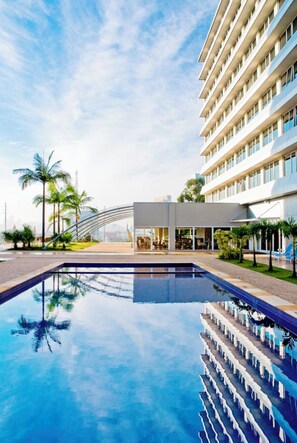 Outdoor pool, open 6:00 AM to 10:00 PM, pool umbrellas, pool loungers