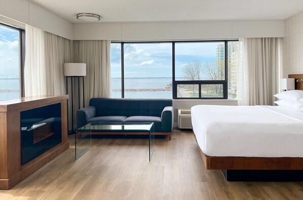 Habitación Deluxe, 1 cama King size, en esquina | Sábanas de algodón egipcio, ropa de cama de alta calidad y edredón 