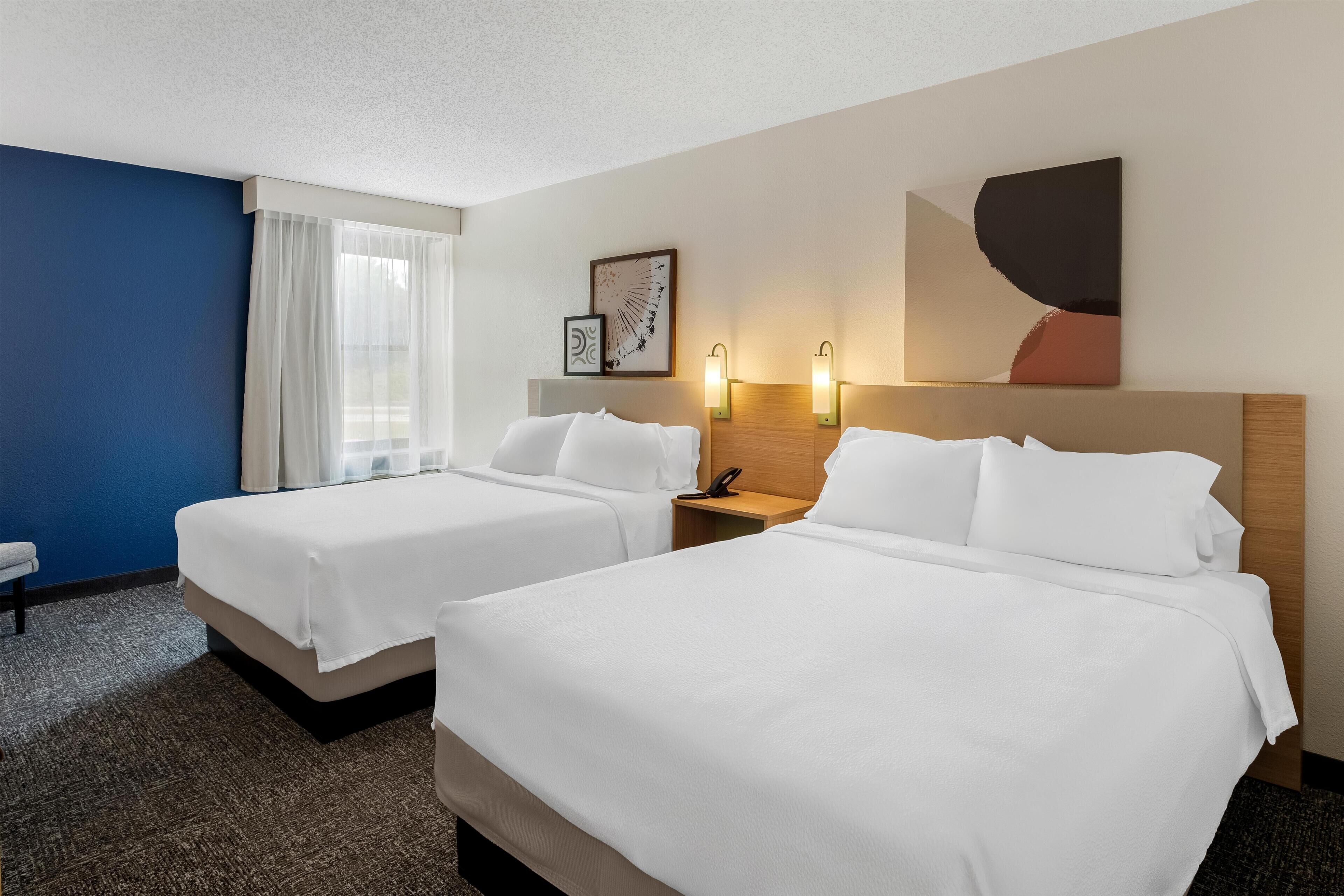 Room, 2 Queen Beds | In-room safe, desk, laptop workspace, blackout drapes