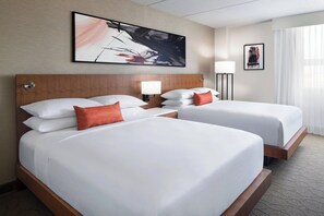 Premium bedding, down duvets, pillow-top beds, in-room safe