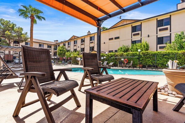 Outdoor pool, open 9:00 AM to 8:00 PM, free cabanas, sun loungers - Ellis Island Hotel (Las Vegas)