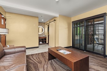 Suite, 2 Queen Beds, Balcony | Living area | 43-inch flat-screen TV with cable channels, TV at Ellis Island Hotel