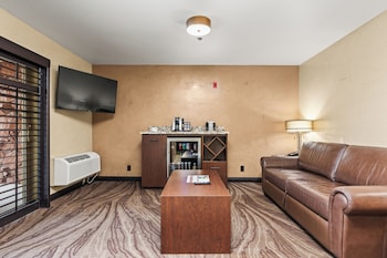 Suite, 2 Queen Beds, Balcony | Living area | 43-inch flat-screen TV with cable channels, TV at Ellis Island Hotel