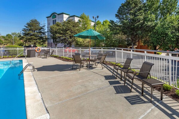 Seasonal outdoor pool, open 8:00 AM to 10:00 PM, sun loungers