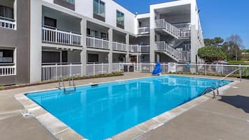 Seasonal outdoor pool, open 8:00 AM to 10:00 PM, sun loungers