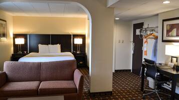 Suite, 1 King Bed, Non Smoking | Premium bedding, in-room safe, laptop workspace, blackout drapes