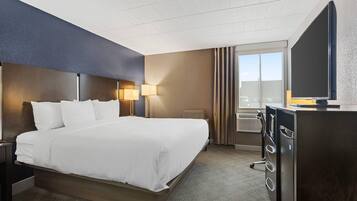 Premium bedding, in-room safe, laptop workspace, blackout curtains