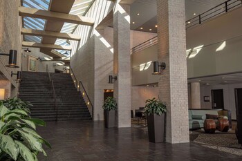 Hotel entrance and lobby at The Inverness Denver, a Hilton Golf & Spa Resort