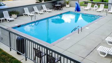 Outdoor pool, open 10 AM to 6:00 PM, pool umbrellas, pool loungers