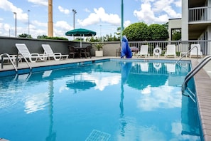 Outdoor pool, open 10 AM to 6:00 PM, pool umbrellas, sun loungers