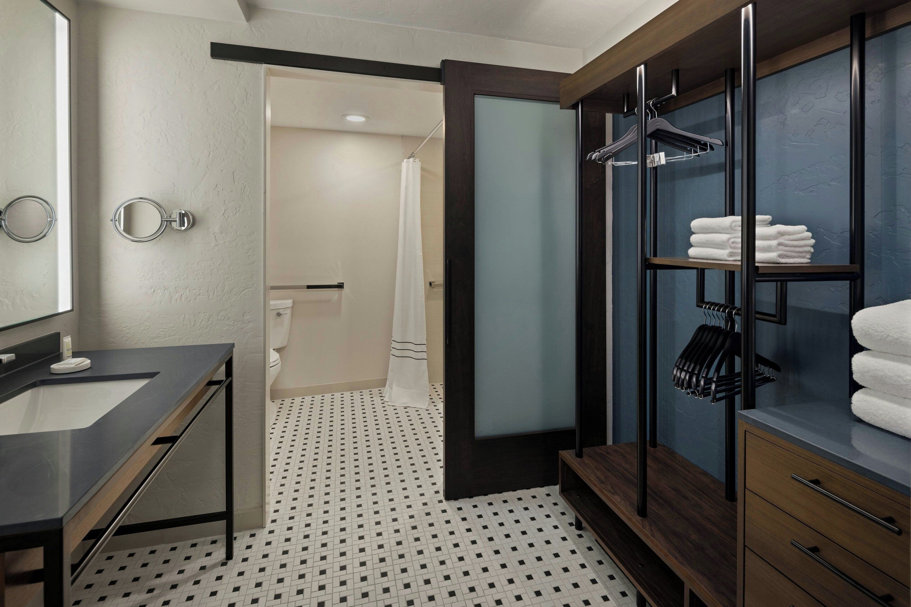 combined shower/bathtub, free toiletries, hair dryer, towels