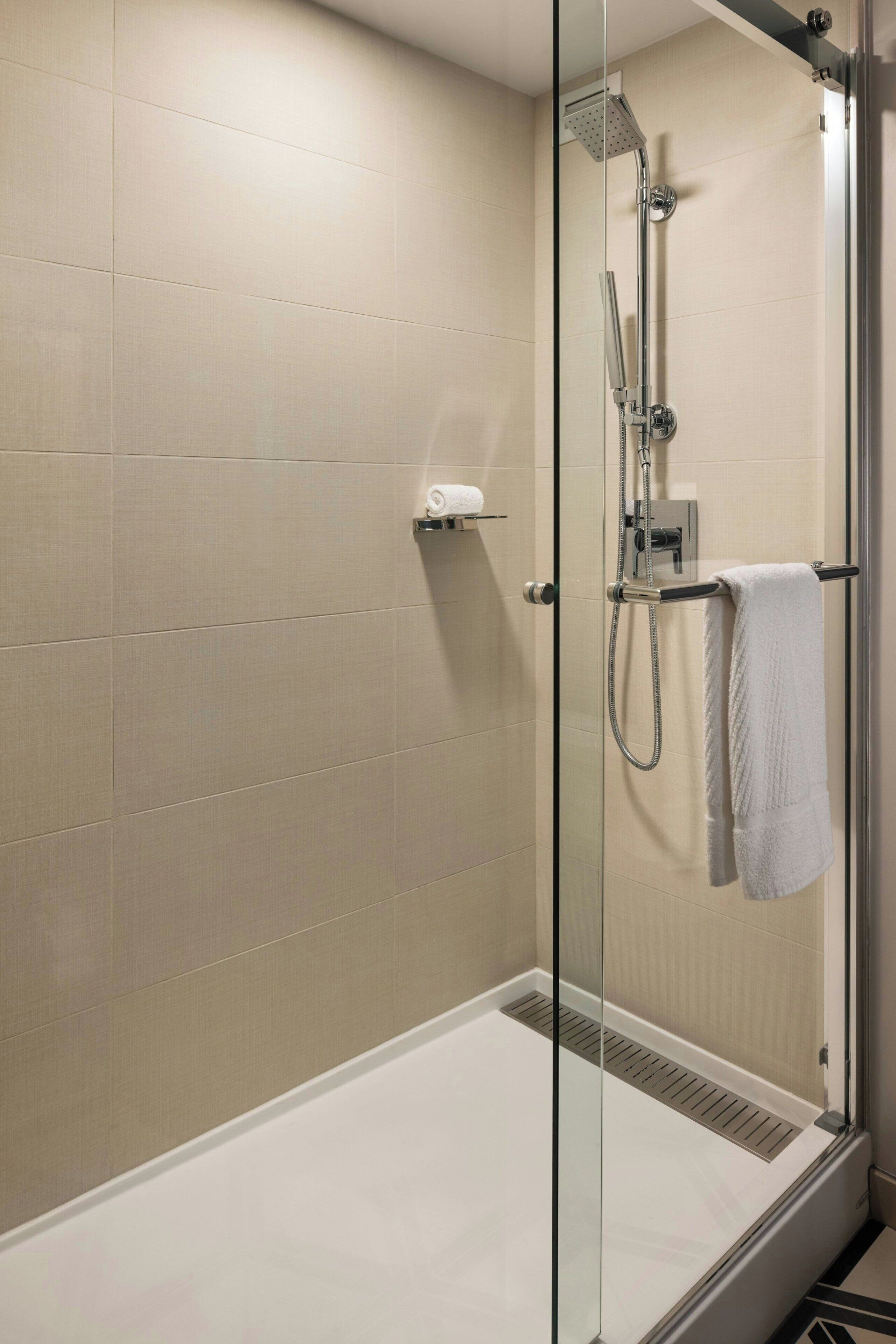 combined shower/bathtub, free toiletries, hair dryer, towels