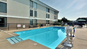 A swimming pool with a lifeguard chair and a sign indicating no diving allowed. - Holiday Inn Express Danville by IHG (Danville)