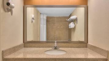 Bathtub, free toiletries, hair dryer, towels