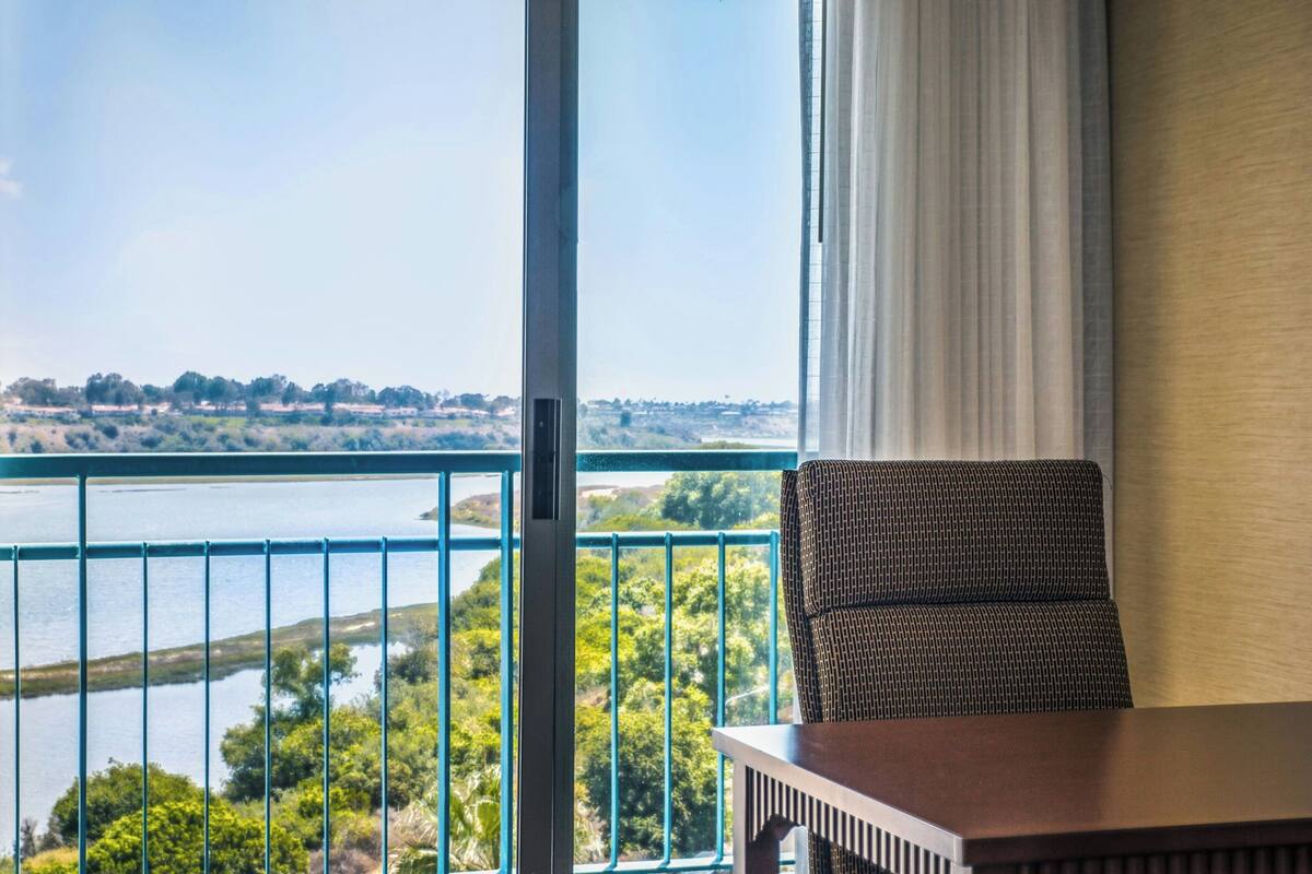 suite, 1 bedroom, balcony, bay view | premium bedding, pillow-top beds, minibar, individually furnished