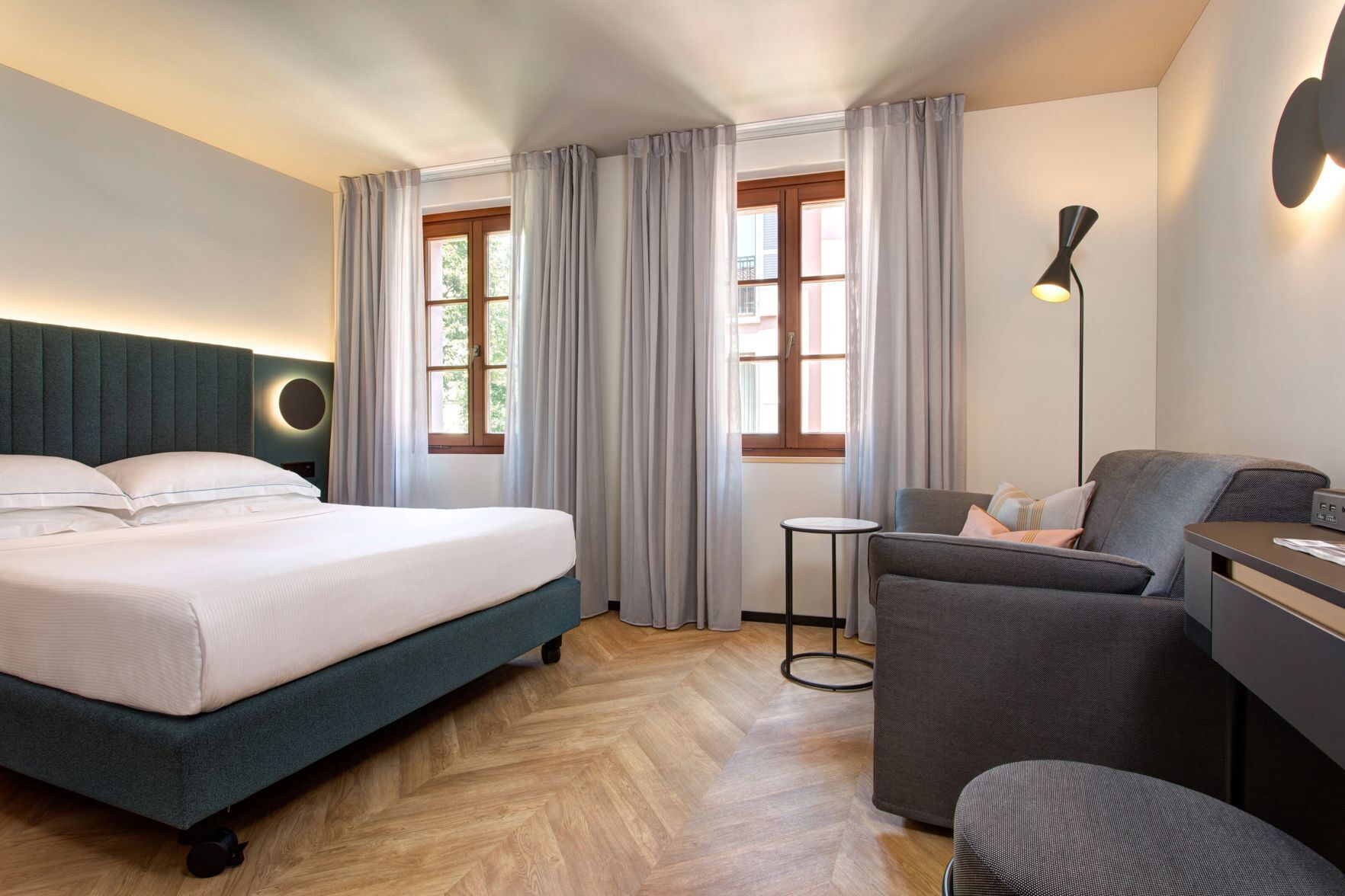 Premium bedding, down comforters, minibar, in-room safe