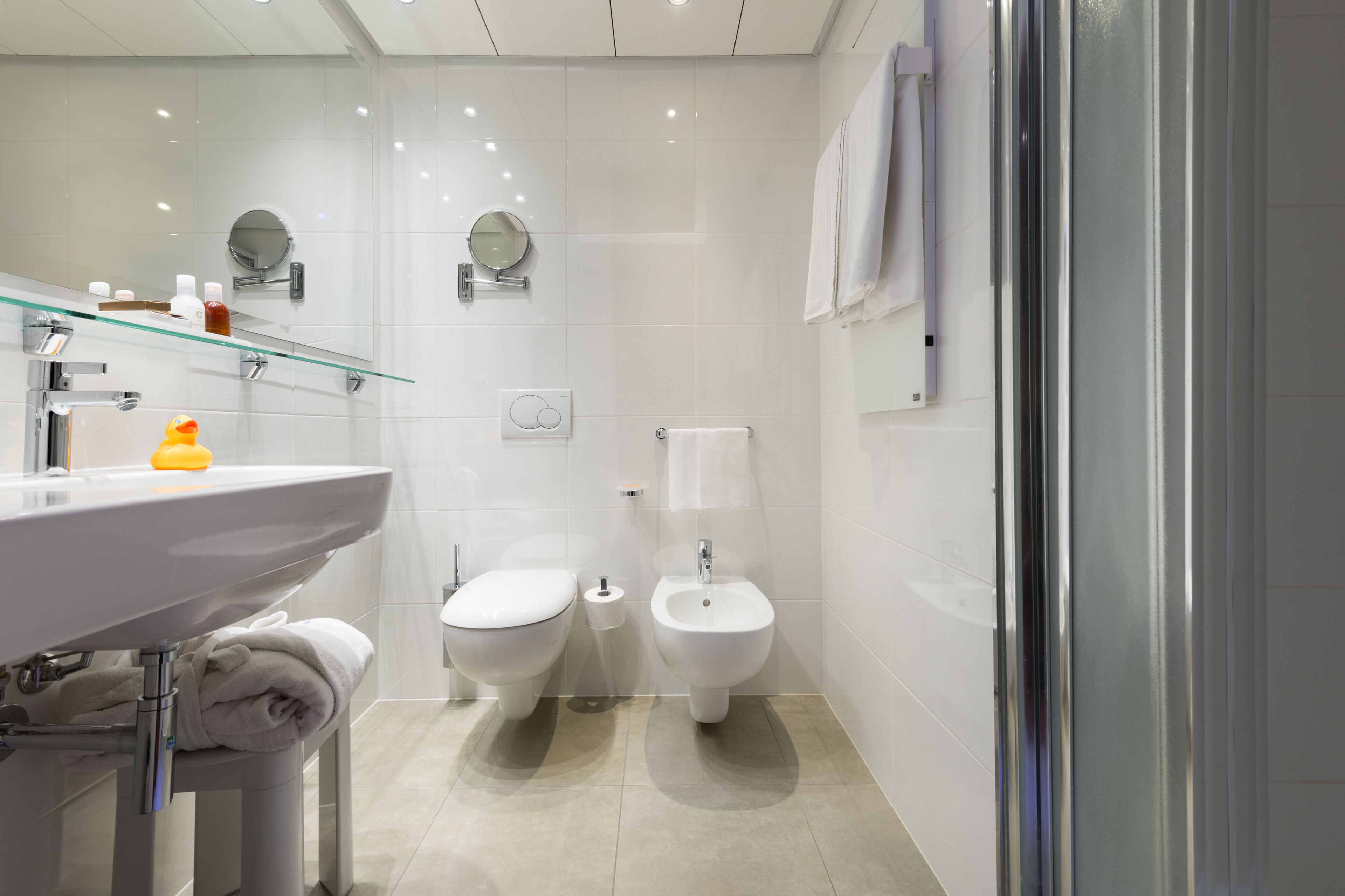 eco-friendly toiletries, hair dryer, towels