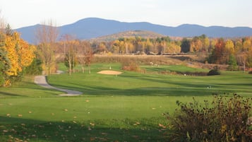 Enjoy a round of golf on our well-maintained course surrounded by trees and rolling hills.