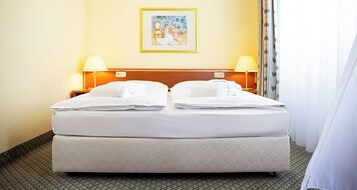 开间 | 防过敏的被褥、办公桌、免费 WiFi、床单