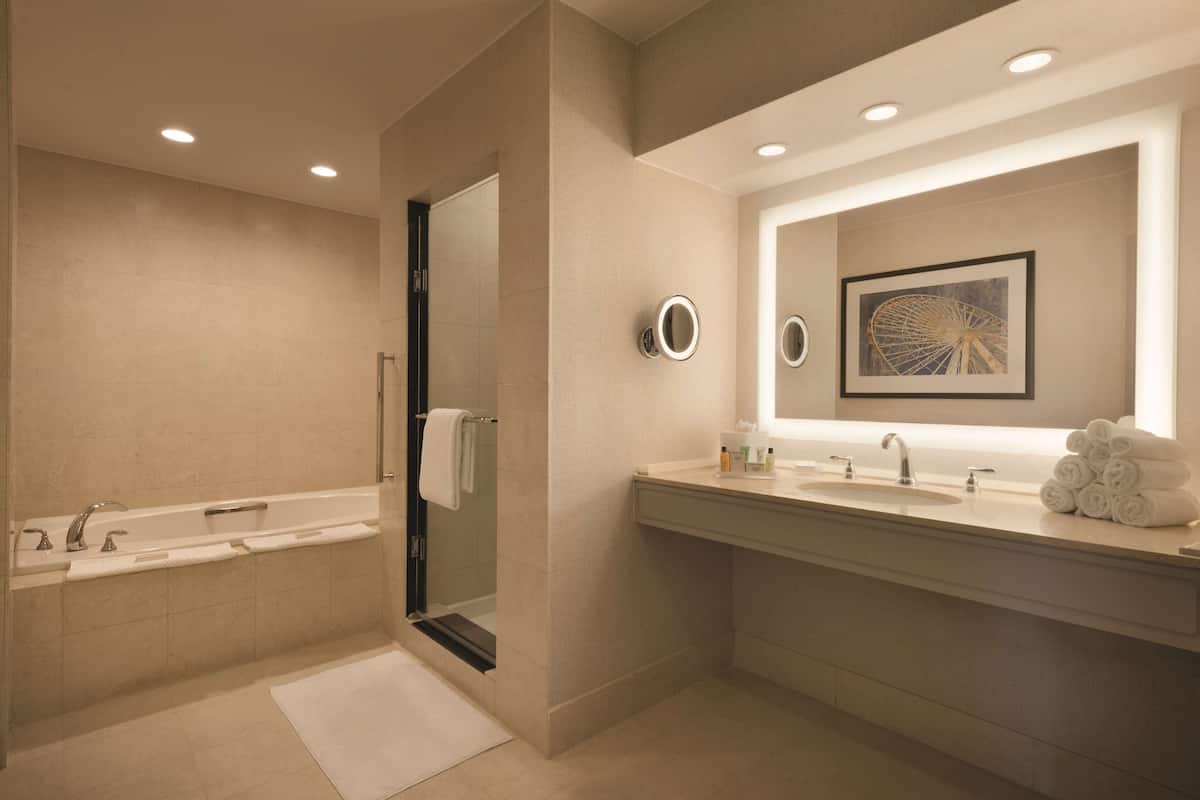 presidential suite, 1 king bed, non smoking | bathroom | eco-friendly toiletries, hair dryer, towels, soap