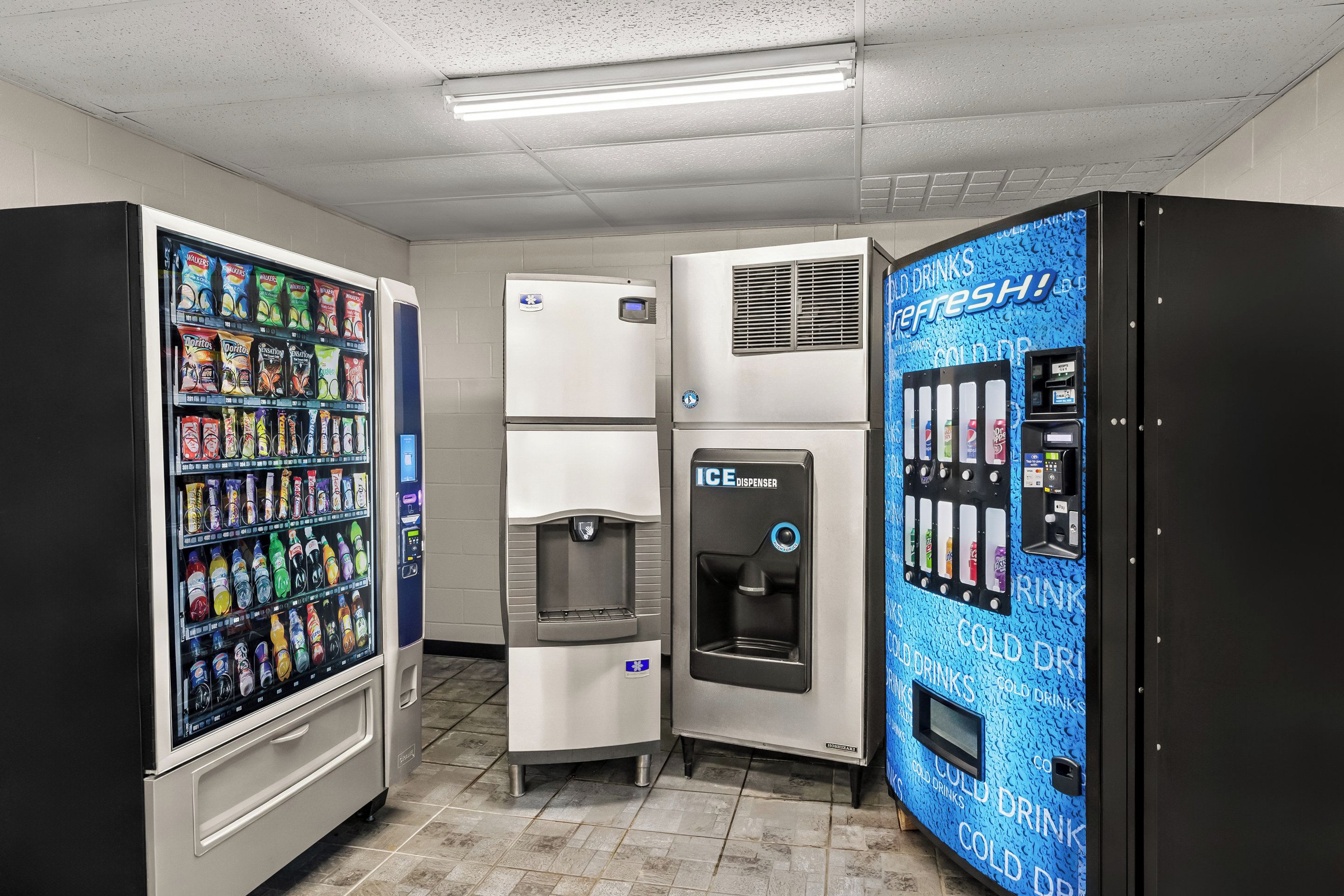 A vending area with snack and drink options, including a water dispenser and a beverage vending machine.