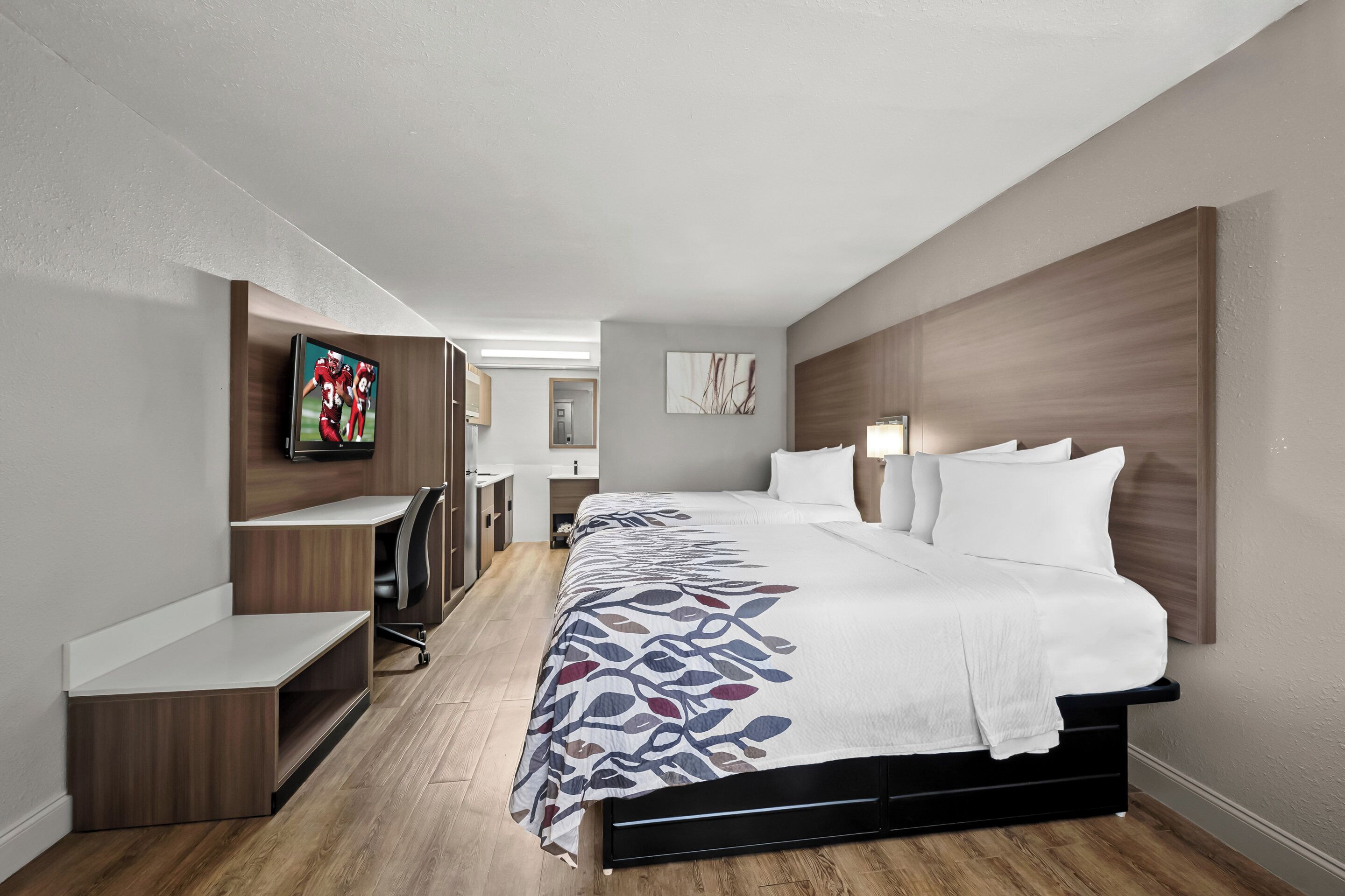 Desk, laptop workspace, blackout drapes, free cribs/infant beds