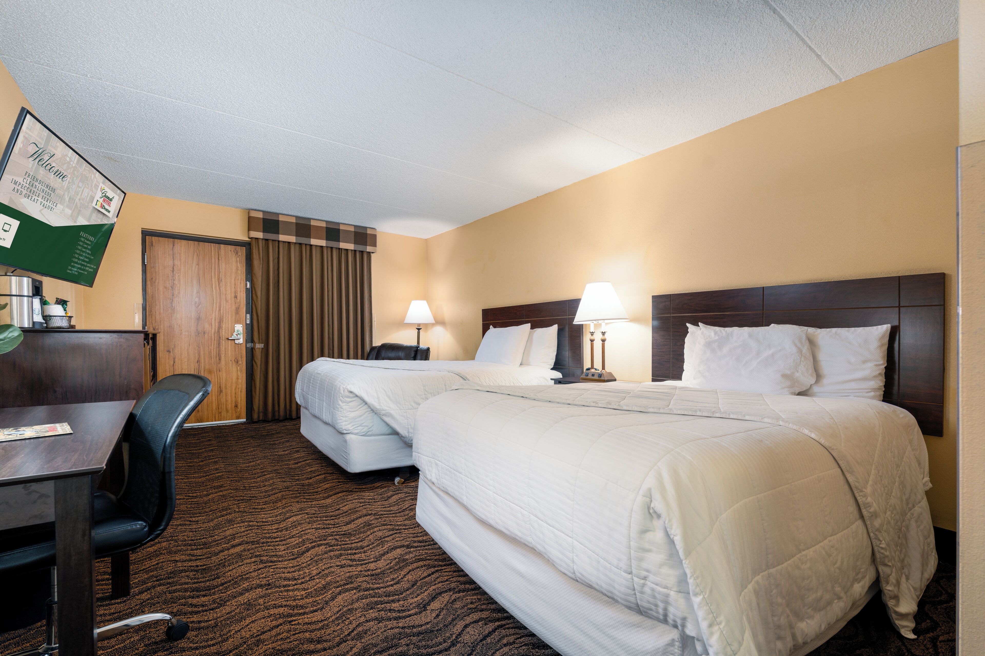 Pillow-top beds, desk, blackout curtains, iron/ironing board