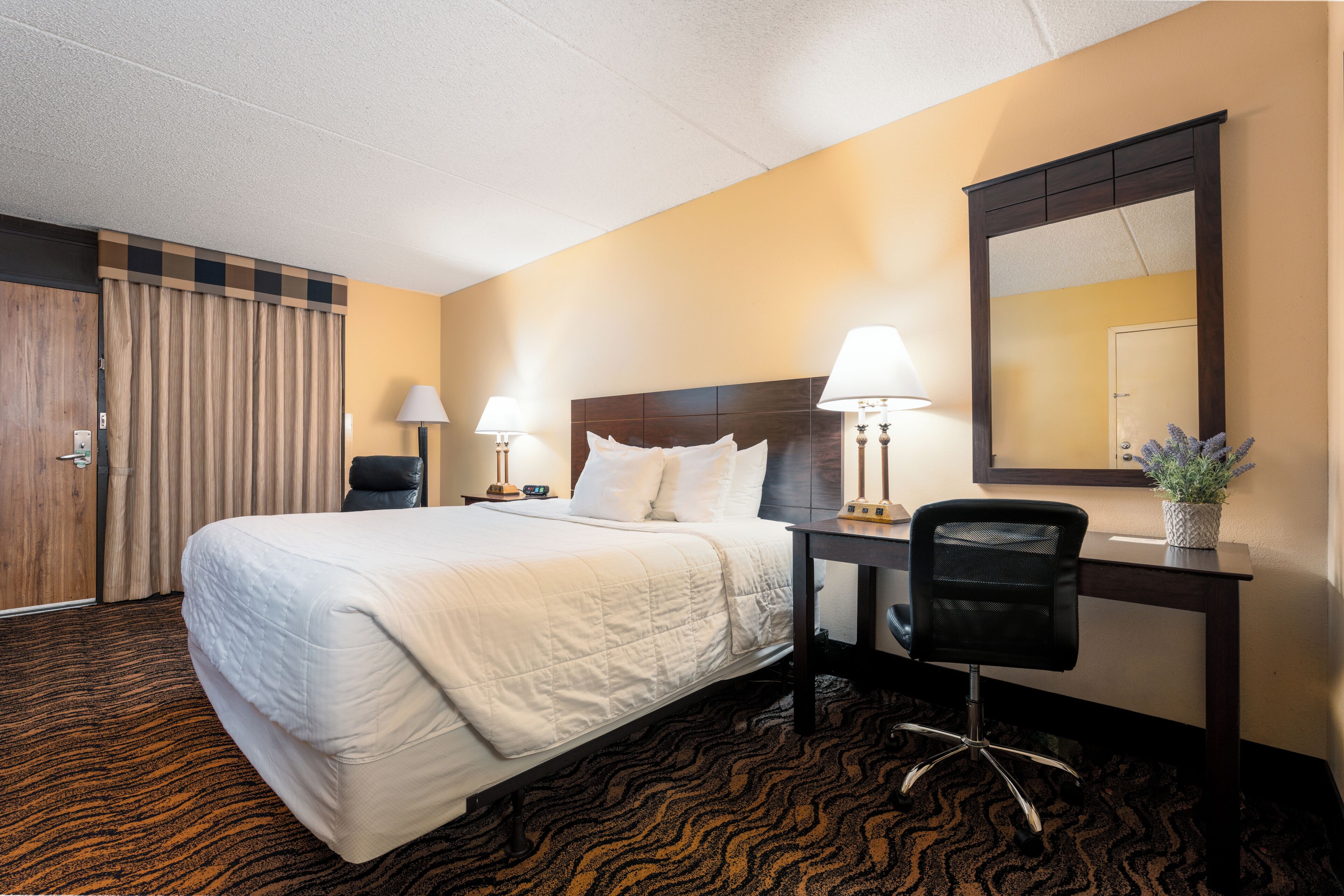 Pillow-top beds, desk, blackout curtains, iron/ironing board