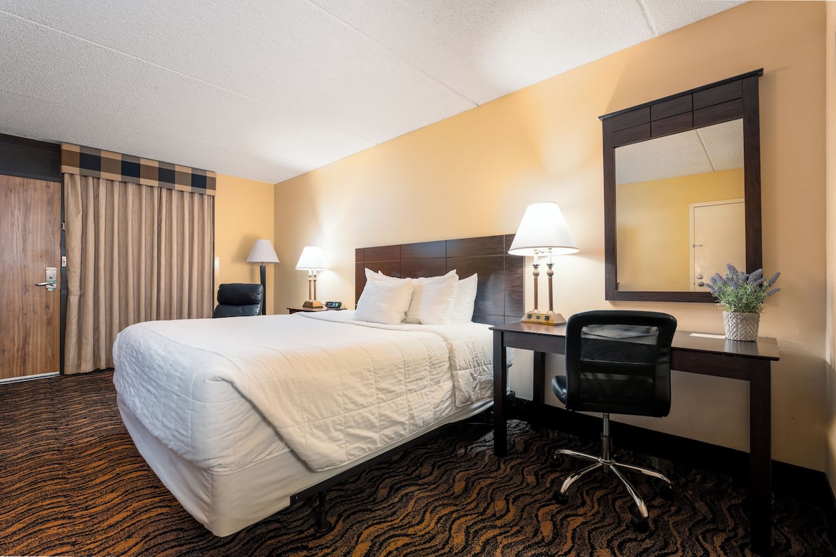 Pillowtop beds, desk, blackout drapes, iron/ironing board