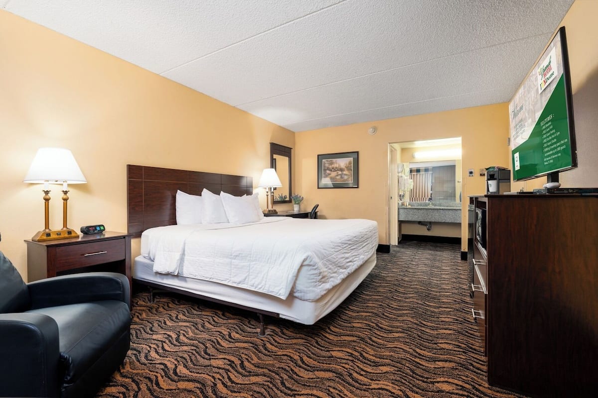 Pillowtop beds, desk, blackout drapes, iron/ironing board