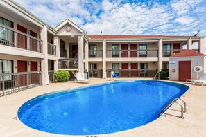 Seasonal outdoor pool, open 10:30 AM to 10:30 PM, pool umbrellas