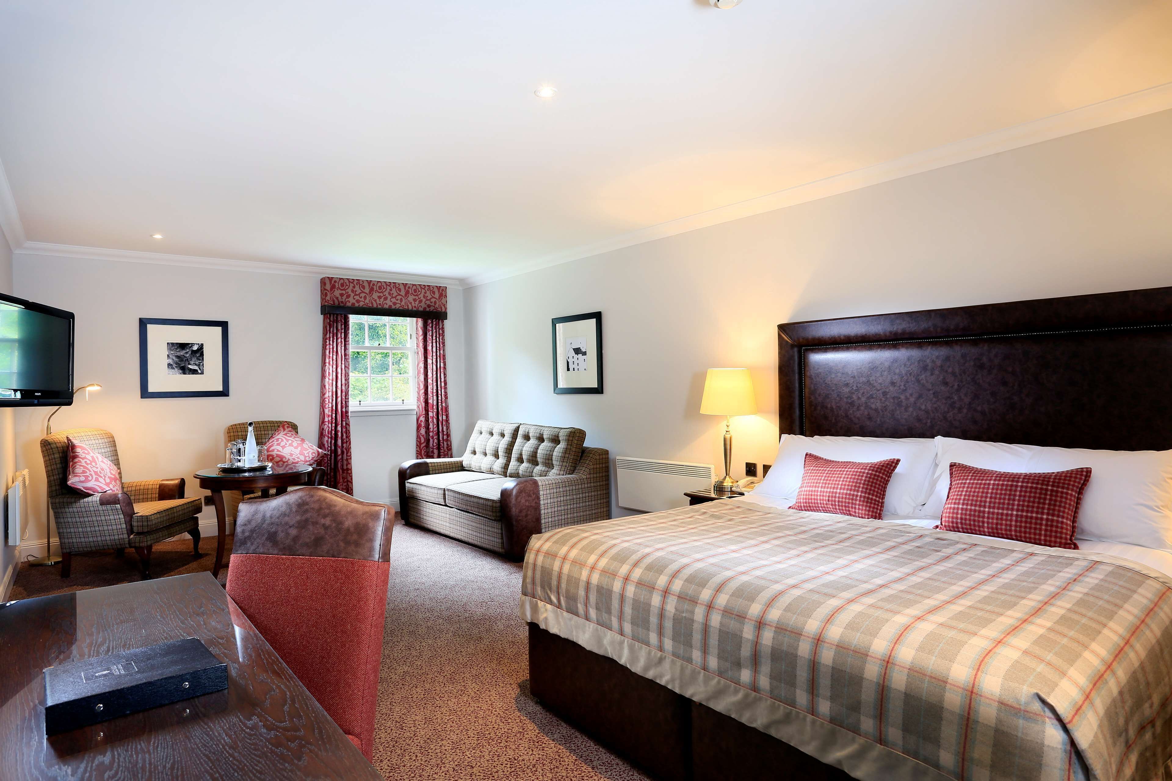 Kamar Deluks, 1 Tempat Tidur Double (Deluxe Family 4) | Seprai antialergi, meja kerja, dan ruang kerja ramah laptop