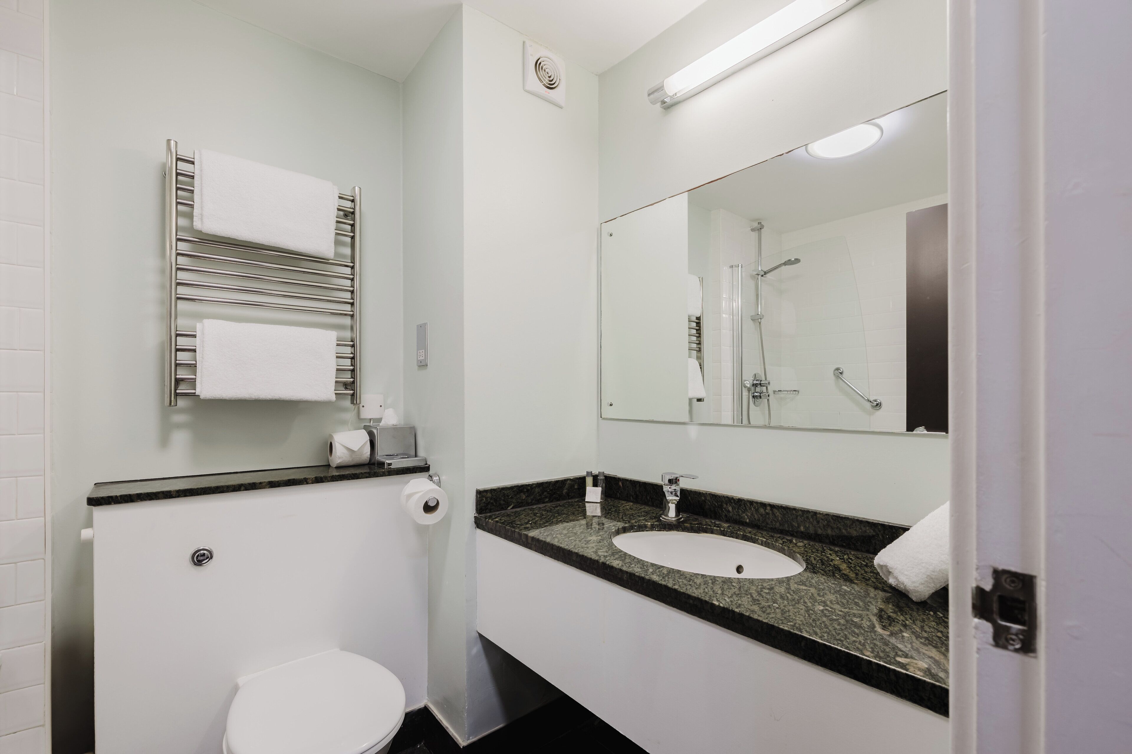 combined shower/bathtub, deep-soaking bathtub, designer toiletries