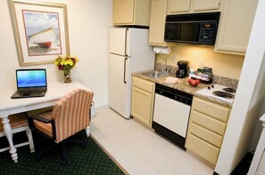 Fridge, microwave, stovetop, coffee/tea maker