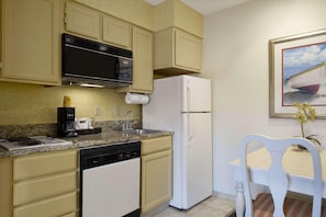 Fridge, microwave, stovetop, coffee/tea maker