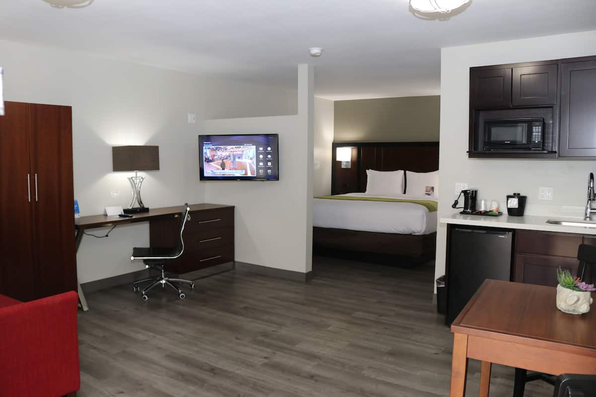 Suite, 1 King Bed, Non Smoking | In-room safe, desk, iron/ironing board, rollaway beds