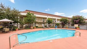 Outdoor pool, open 10 AM to 10 PM, pool umbrellas, sun loungers