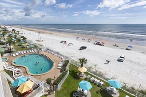 Outdoor pool, open 9:00 AM to 10:00 PM, pool umbrellas, sun loungers