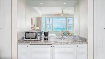 Suite, 1 King Bed, Oceanfront | Private kitchen | Coffee/tea maker, mini-fridge