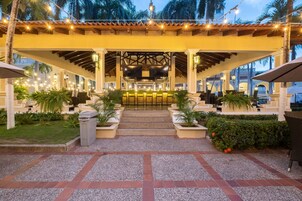 Breakfast, lunch, dinner served; international cuisine, pool views 