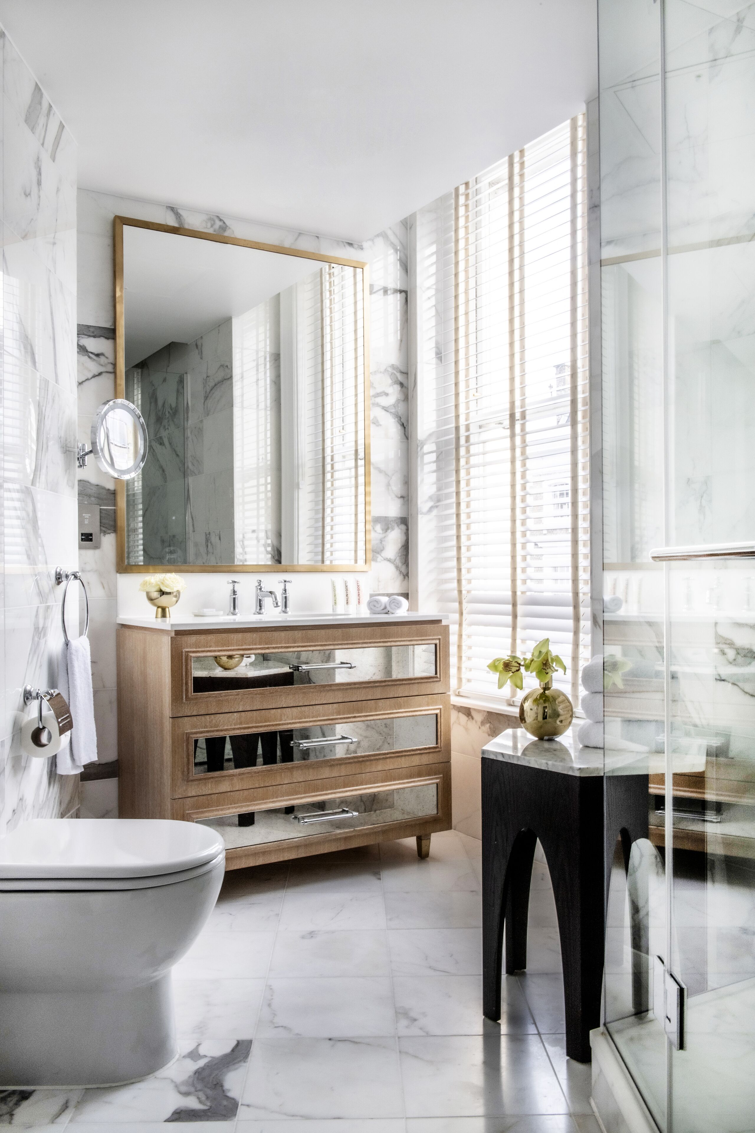 designer toiletries, hair dryer, bathrobes, slippers