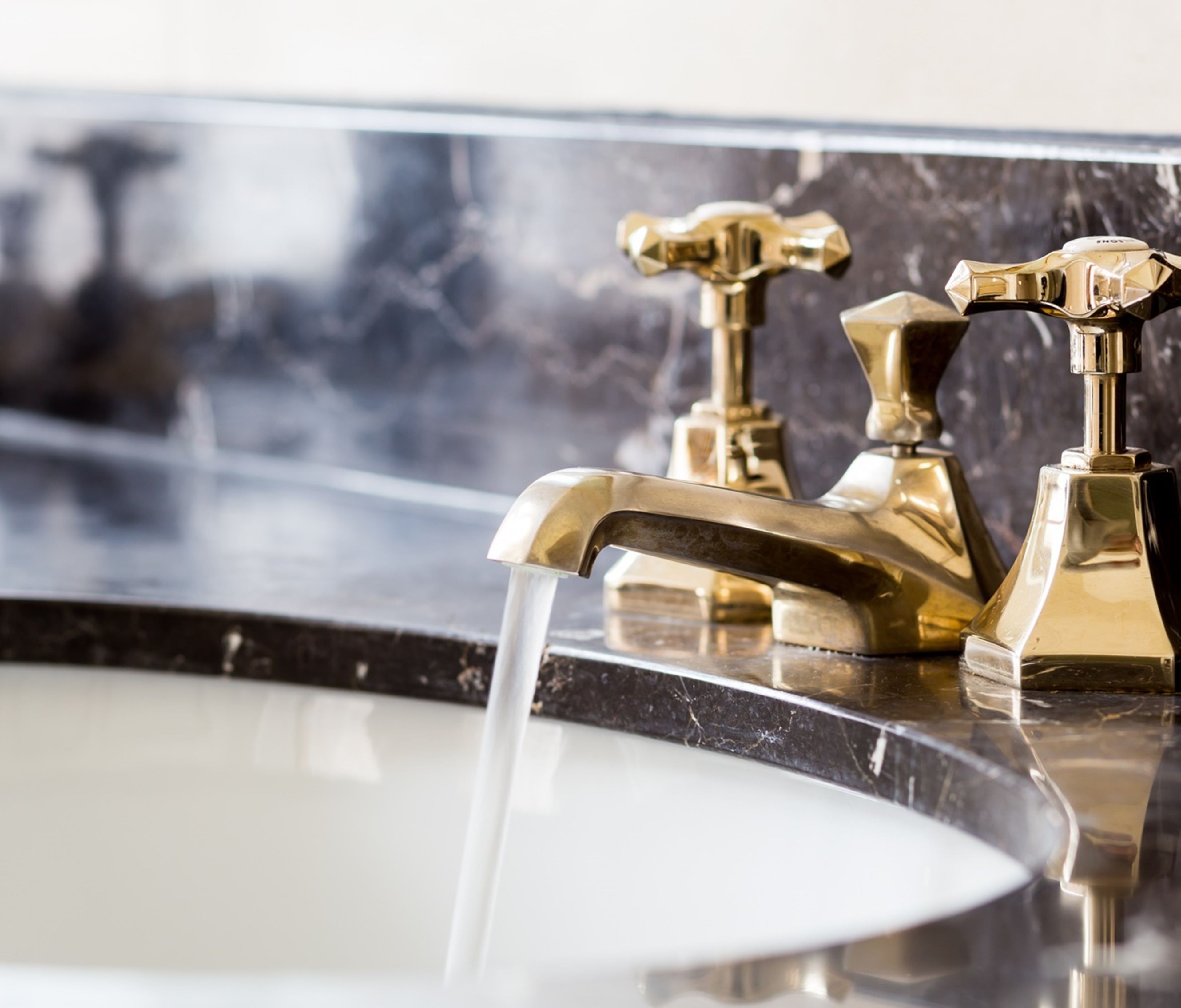 designer toiletries, hair dryer, bathrobes, slippers