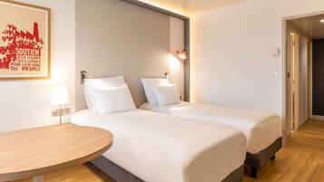 Premium bedding, down comforters, pillowtop beds, minibar