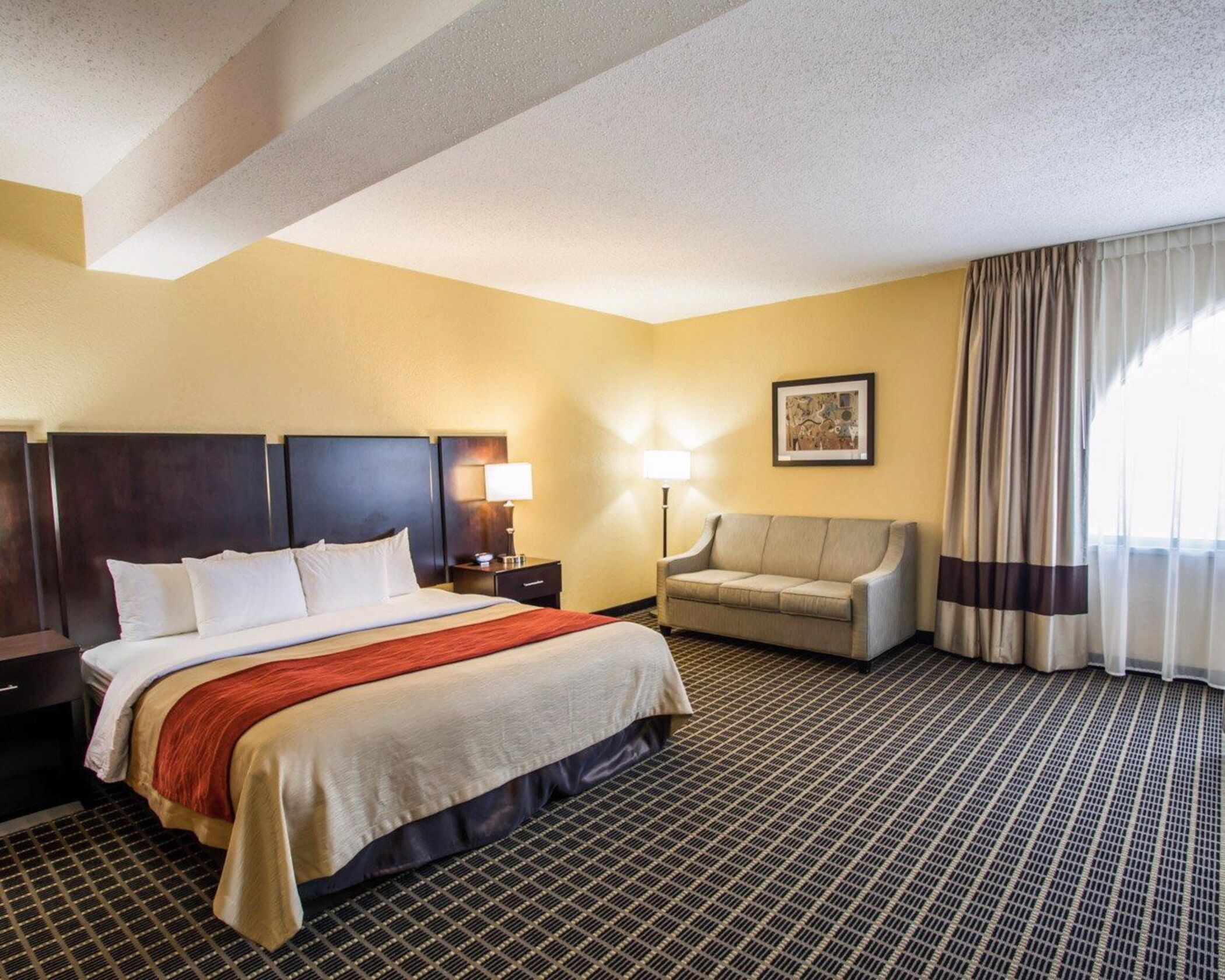 Premium bedding, in-room safe, laptop workspace, soundproofing