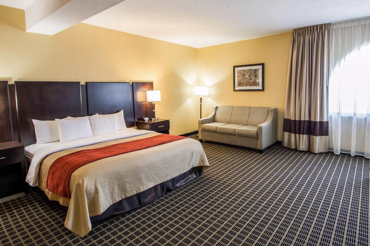 Premium bedding, in-room safe, laptop workspace, soundproofing