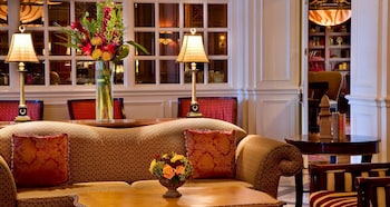 Sitting area in hotel lobby at Warwick Melrose Dallas